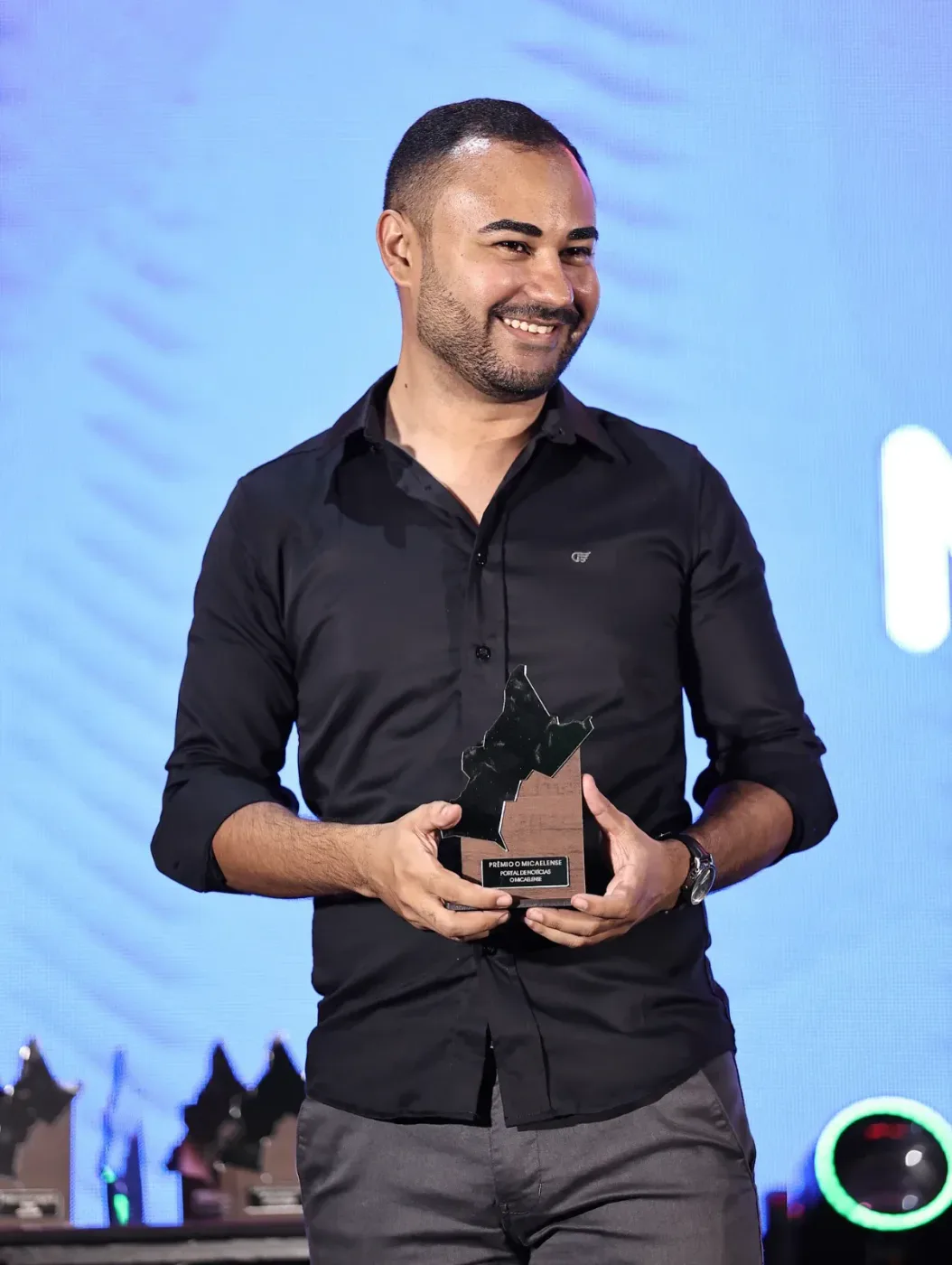 Recebendo troféu de Porto Destaque 2025